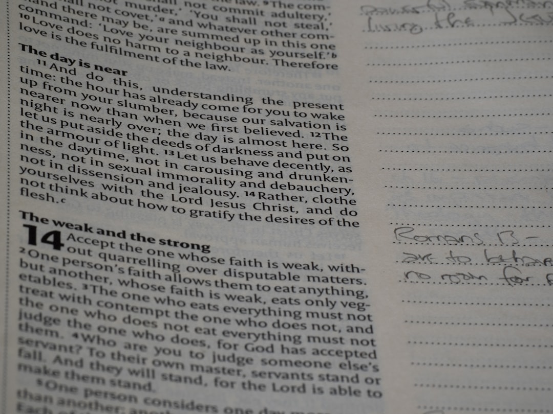 A close up of a book with writing on it