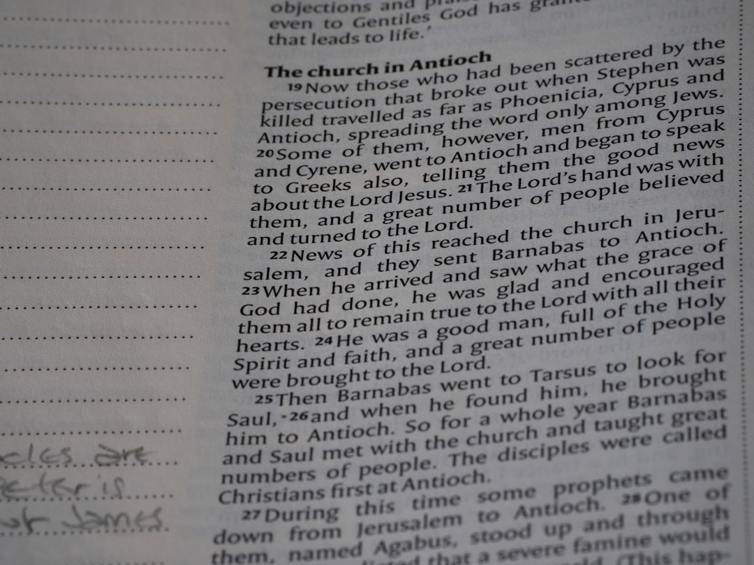 A close up of a book with writing on it
