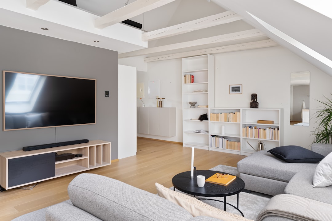 A living room filled with furniture and a flat screen TV