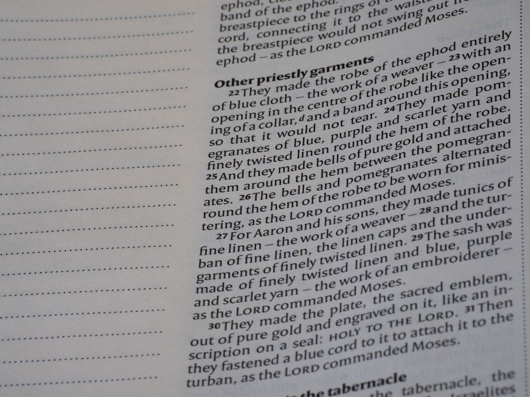 Close-up of an open book with text visible.