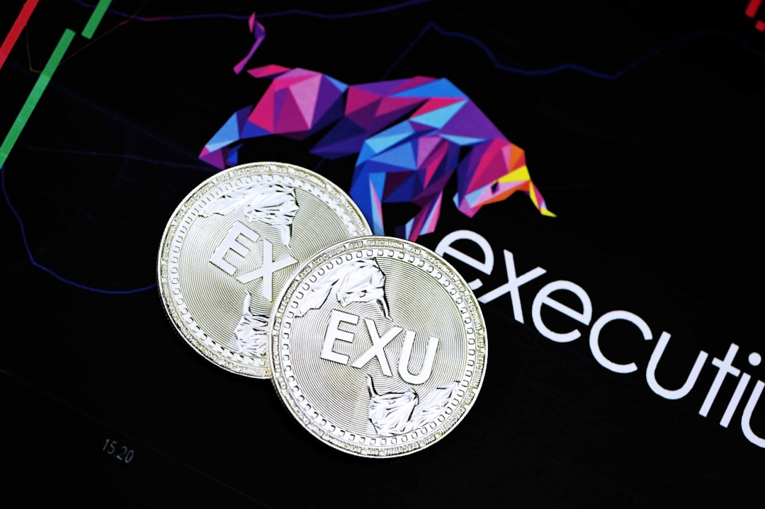 silver and gold round coin