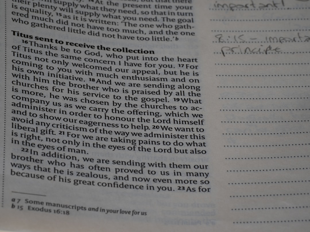 A close up of a book with writing on it