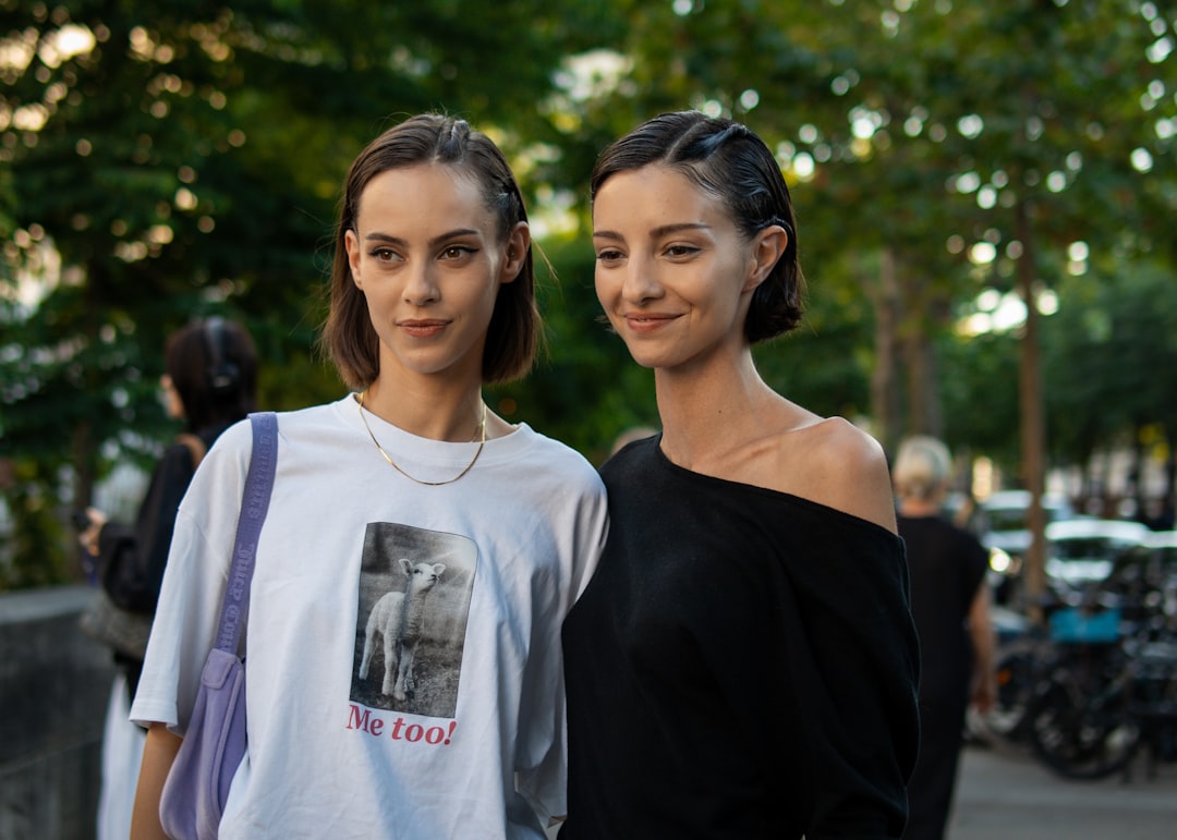 A couple of women standing next to each other